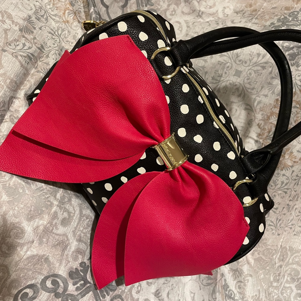 Betsy Johnson leather roomy purse.